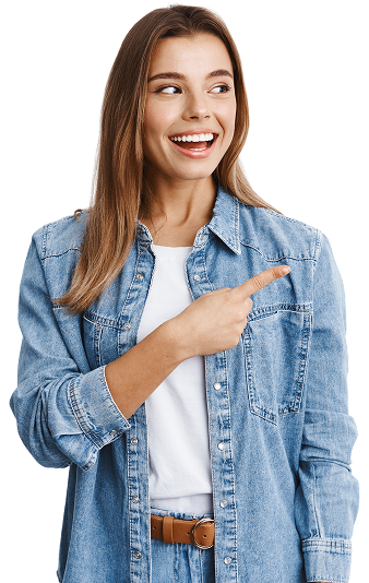 smiling modern girl casual clothes pointing staring left logo with pleased face checking out good deal banner sideways white wall 1 1